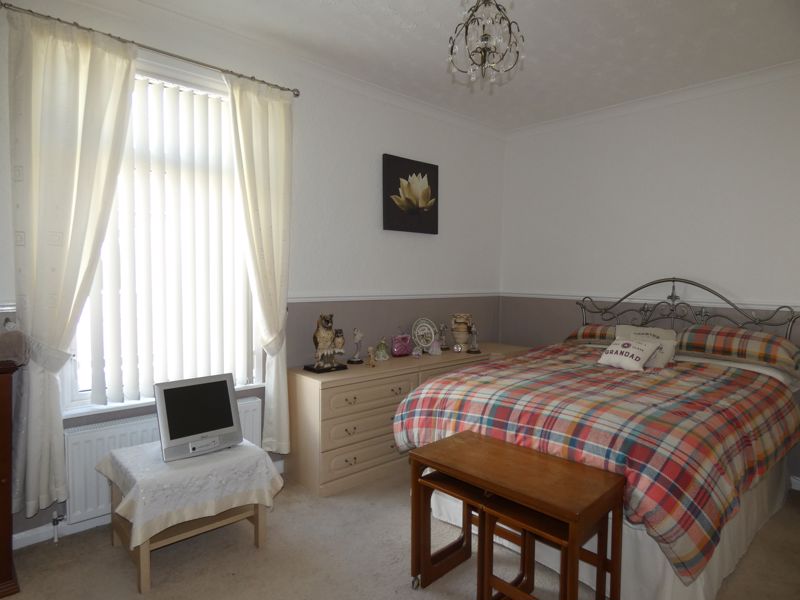 Bedroom One- click for photo gallery